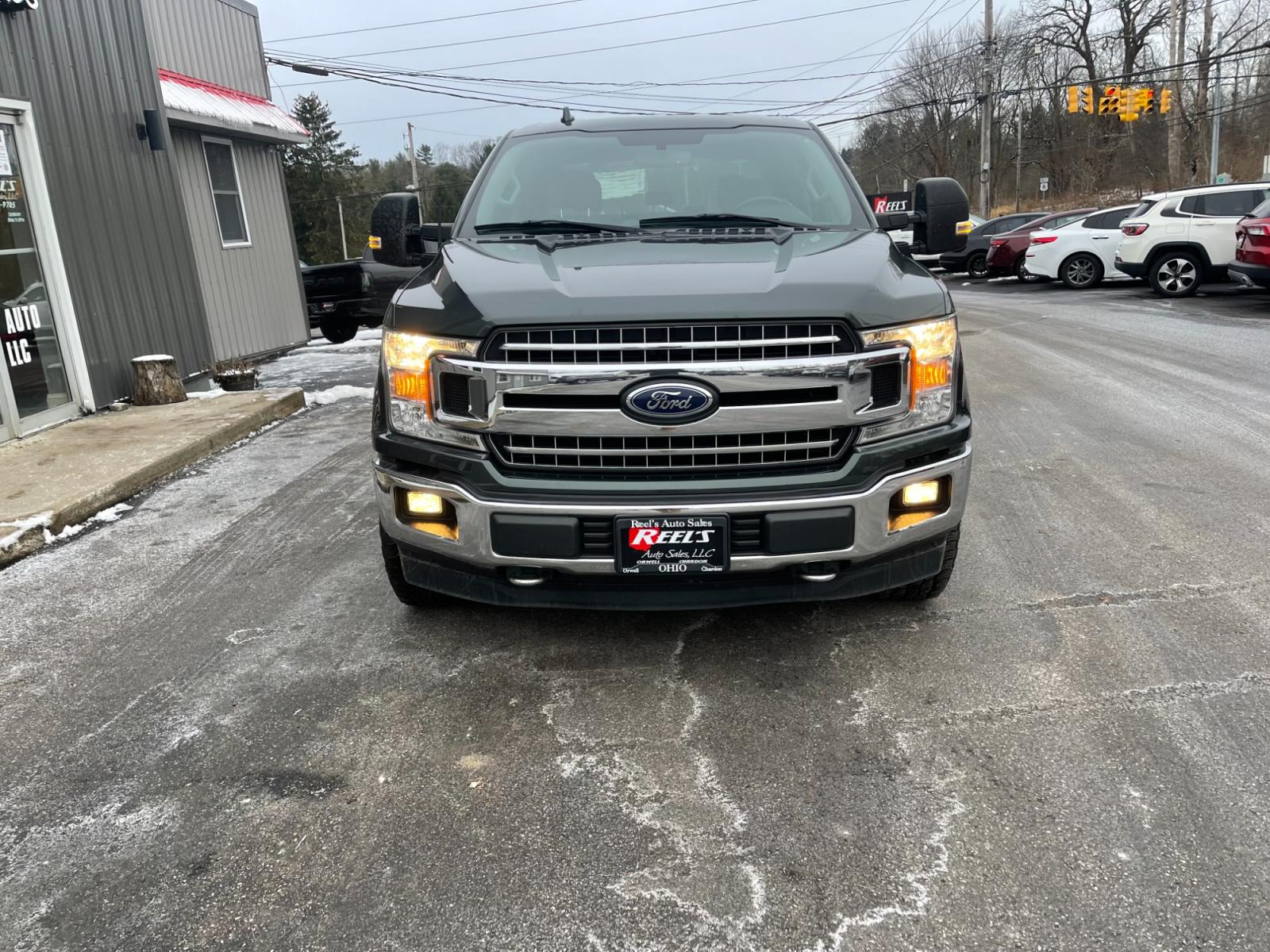2018 Gray /Gray Ford F-150 XLT SuperCrew 5.5-ft. 2WD (1FTEW1E51JK) with an 5.0L V8 OHV 32V FFV engine, 10 Speed Auto transmission, located at 11115 Chardon Rd. , Chardon, OH, 44024, (440) 214-9705, 41.580246, -81.241943 - This 2018 Ford F-150 XLT Crew Cab described is a well-equipped, full-sized pickup truck featuring a robust 5.0-liter V8 engine that runs on flex-fuel and is mated to a smooth 10-speed automatic transmission. Premium amenities such as heated front seats, a high-quality sound system, smartphone integr - Photo #1
